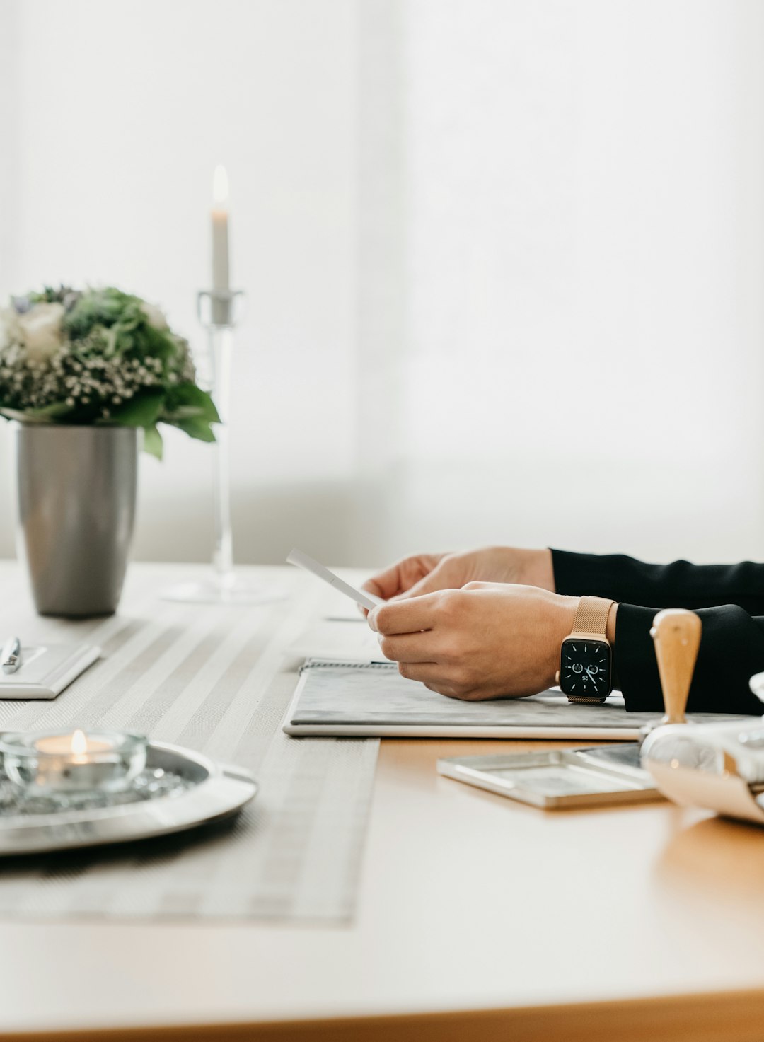 person-writing-on-white-paper-on-table-ghtla-swati